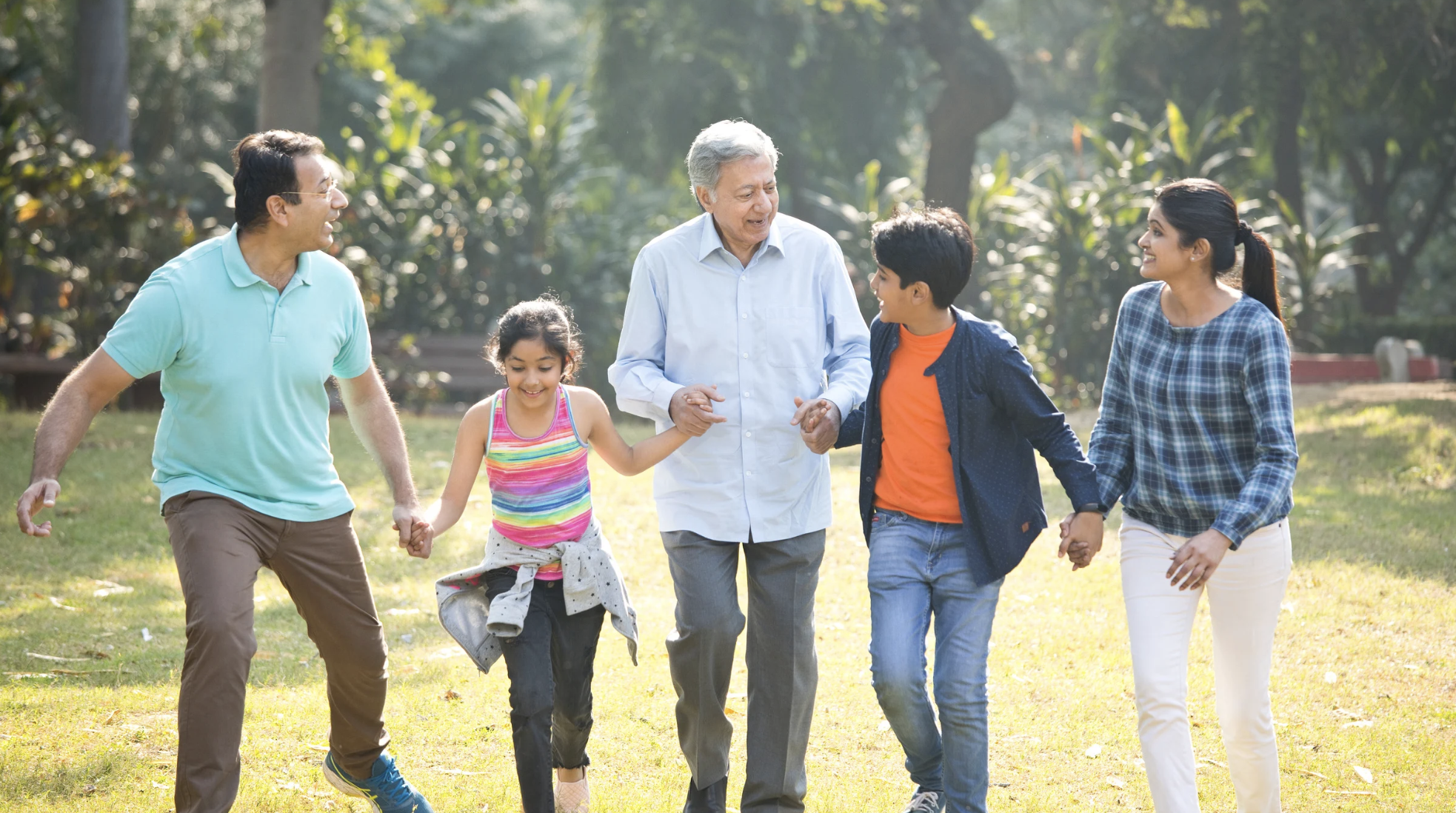 intergenerational south asian family in the park