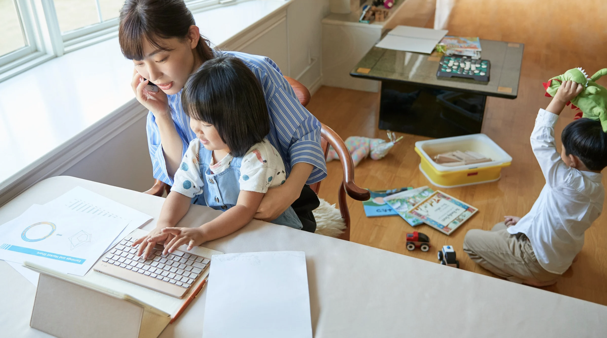 busy mom working from home with kids